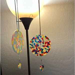 These r sun-catchers.  You can hang anywhere.